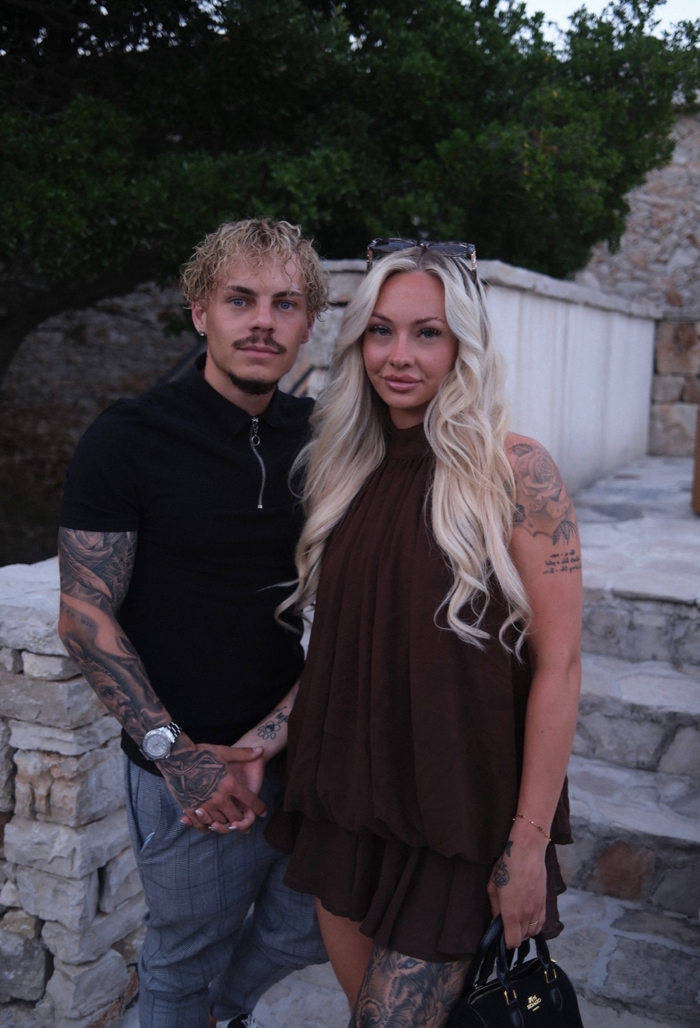 Jack, the artist behind Jacks Tattoos, with his partner