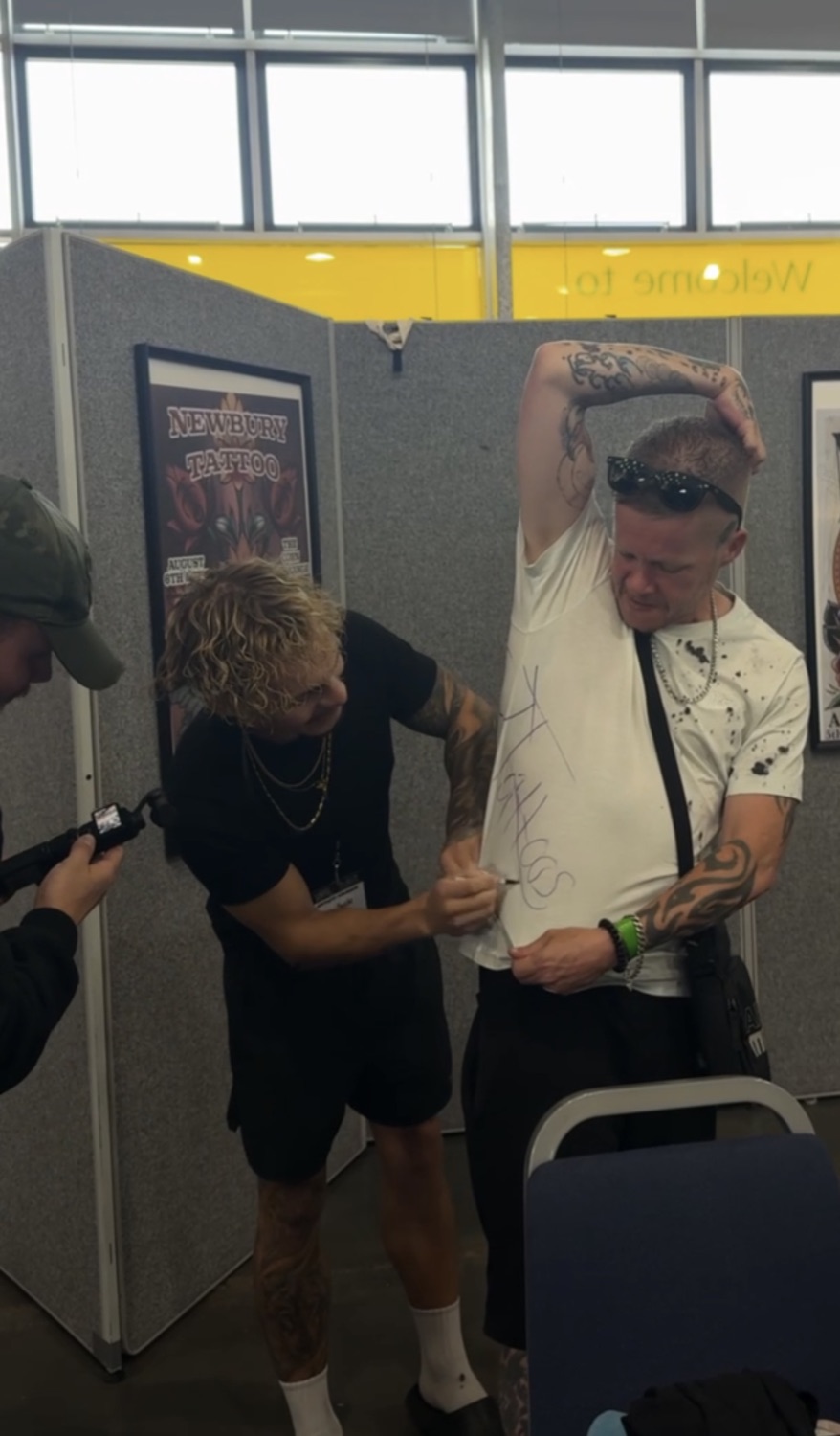 Jack with a client at a tattoo convention