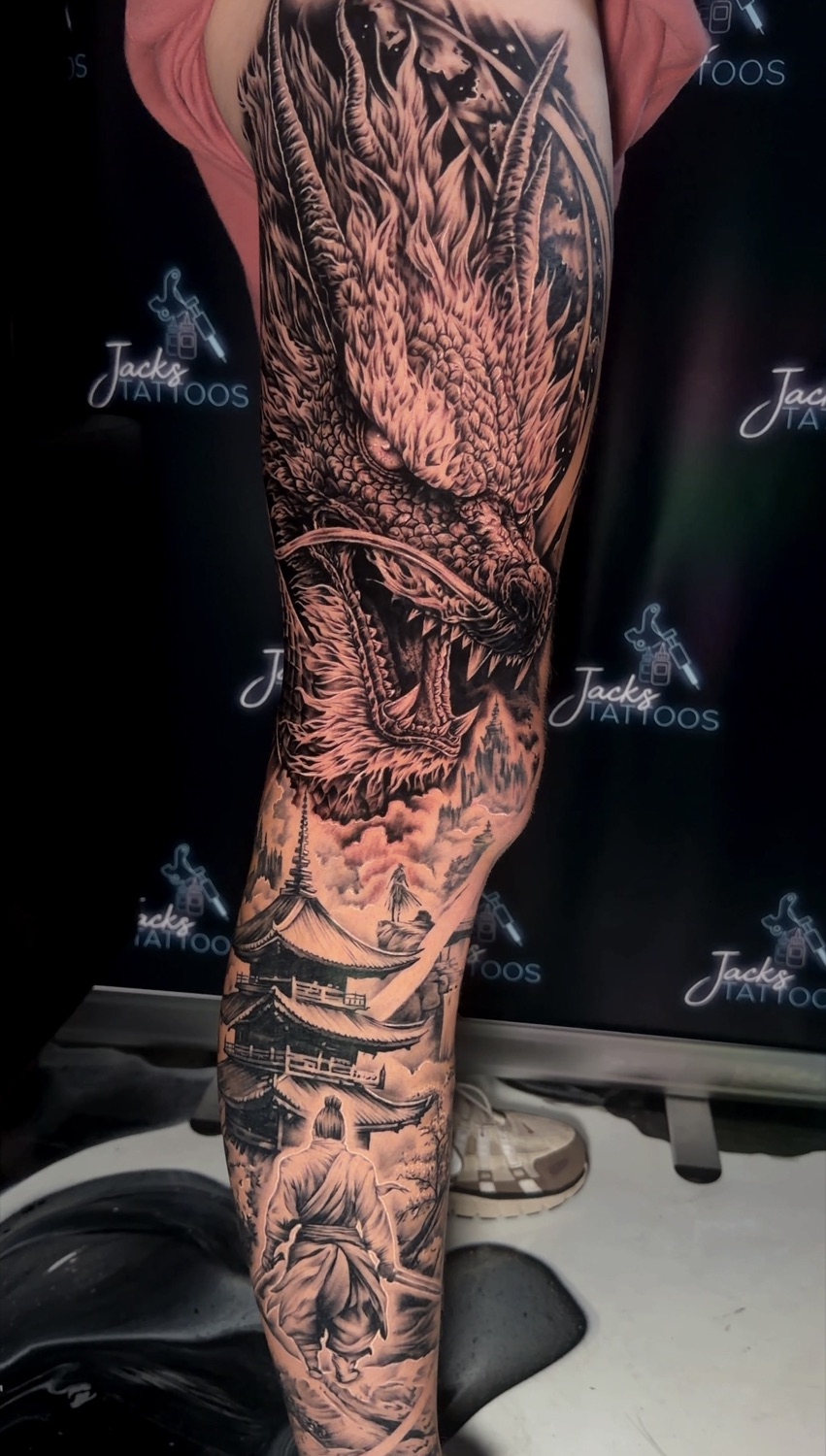 Black and grey dragon and pagoda full sleeve tattoo